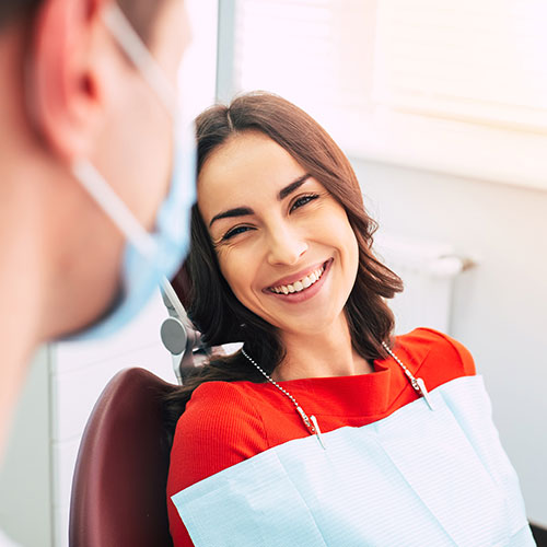 woman smiling at endodontist